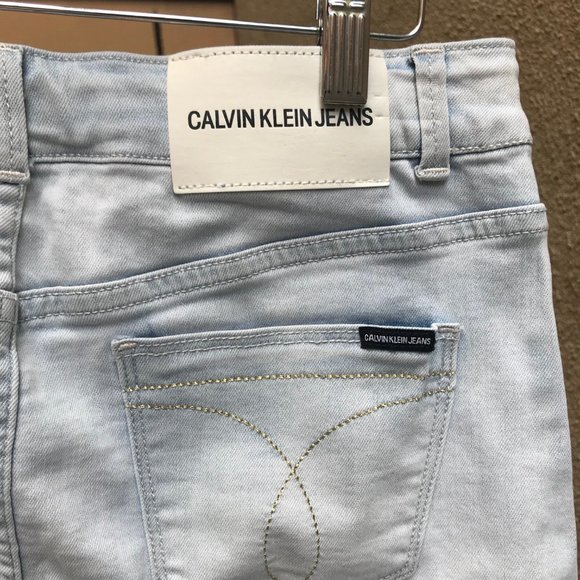 Calvin Klein Stretch Mini Denim Skirt in Light Wash & Colorblock Patchwork - Picture 4 of 7